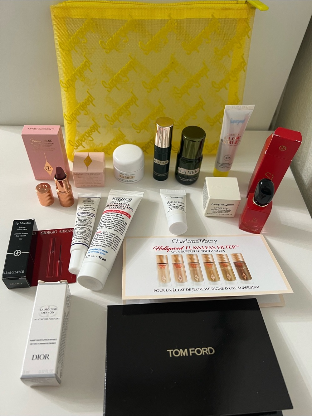 Supergoop! New Yellow Mesh Travel Pouch with mini skin care fsamples bundle. - Picture 8 of 8